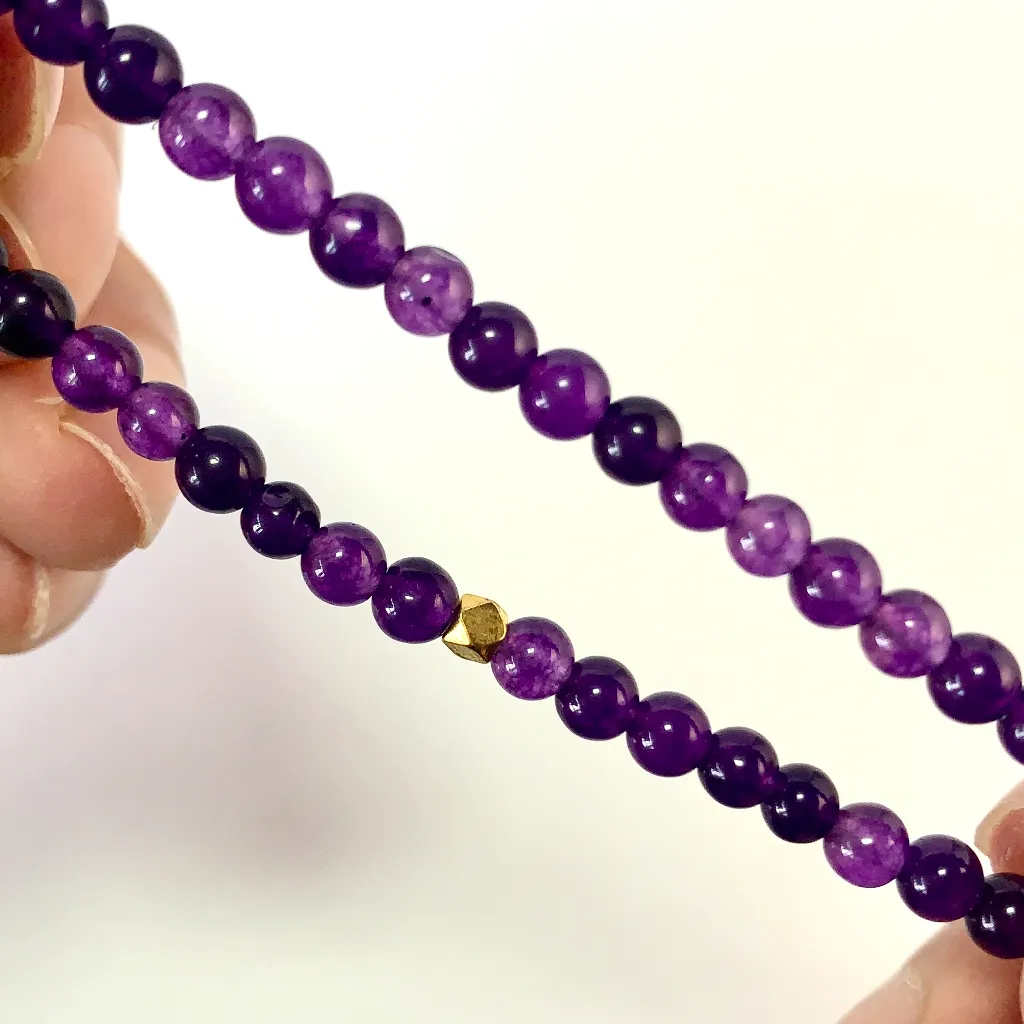 Amethyst Bracelet detail — natural purple tones and polished surface