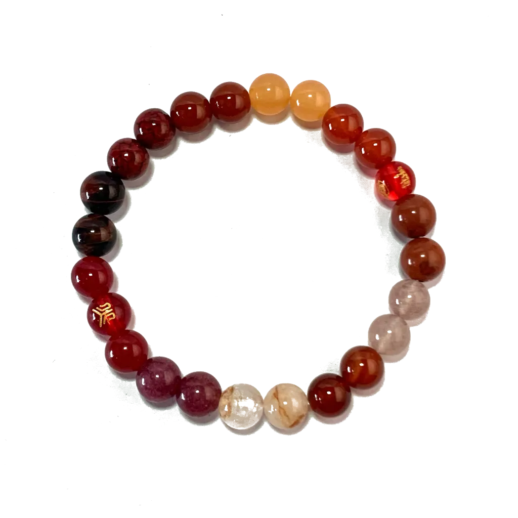 The Fire Element Bracelet in 8mm warm stones, laid on a white background