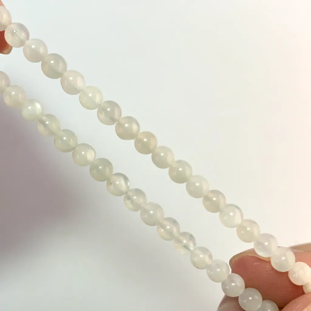 White Agate Bracelet 4mm detail — translucent white agate surface