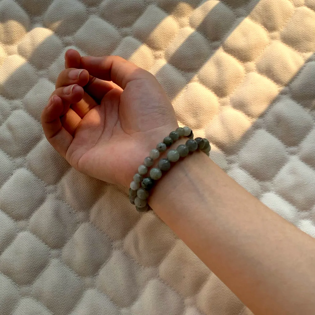 6mm  White Flash Stone Bracelet layered with 8mm  White Flash Stone Bracelet on the wrist - a stacked everyday styling